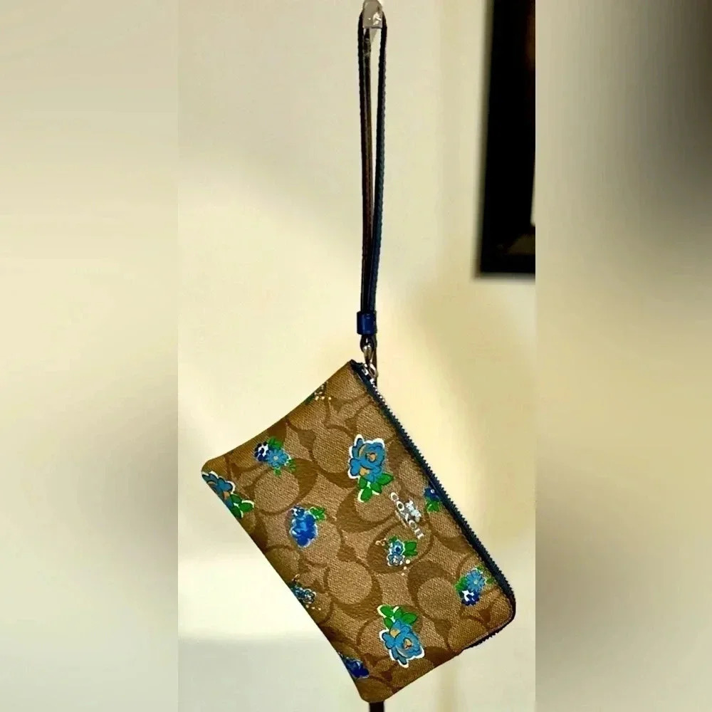 Gently Used COACH F57588 Zip Wristlet in Floral Print Coated Canvas